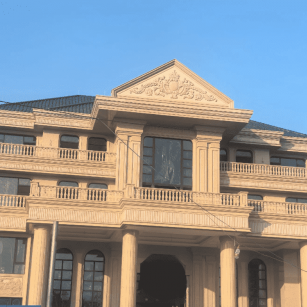 深圳黄金麻别墅外墙干挂石材效果示例