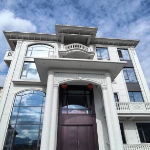 深圳白麻别墅外墙干挂石材效果示例