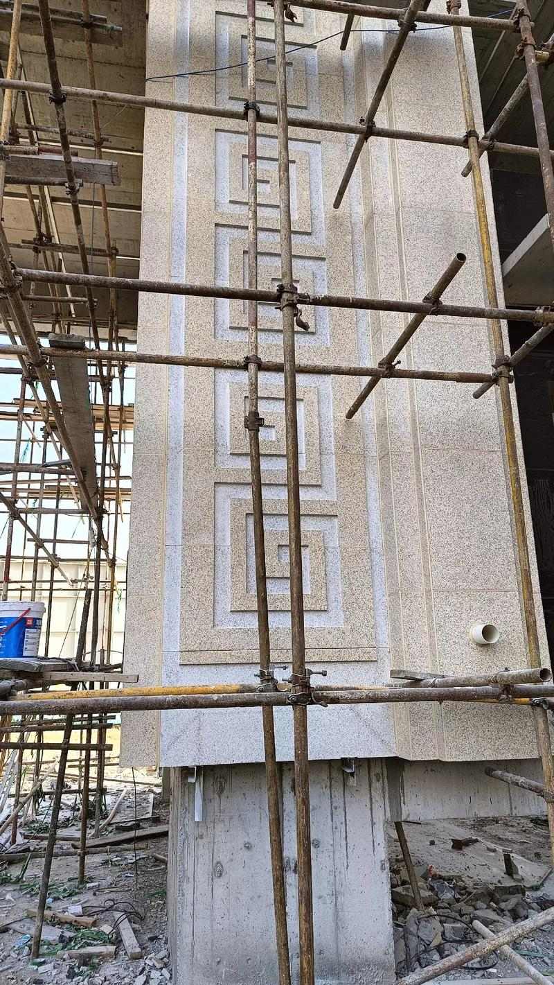 深圳 黄金麻花岗岩别墅外墙干挂回纹造型效果