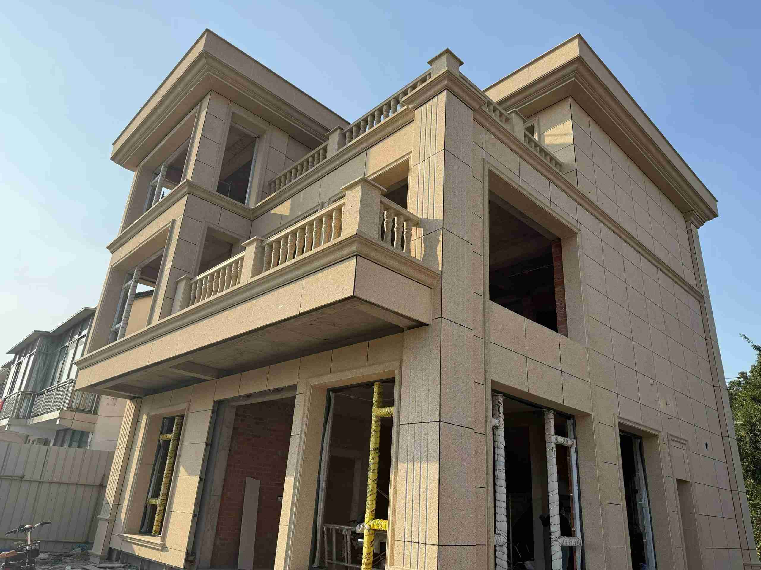 深圳 黄金麻花岗岩石材荔枝面外墙干挂效果展示